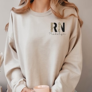 Custom Registered Nurse sweatshirt, Personalized Name Nurse hoodie, RN Pocket Outfit, RN Grad Tee, New Nurse Outfit, Nurse Gift
