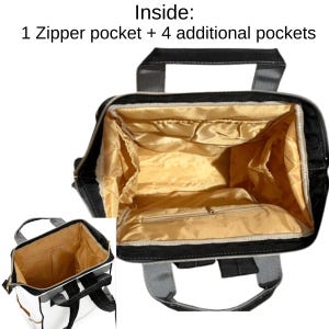 May include: Black and white backpack with a gold interior. The bag has a zipper pocket and four additional pockets. The bag has a top handle and shoulder straps. The text "Inside: 1 Zipper pocket + 4 additional pockets" is visible.