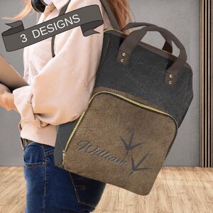 Black Brown Diaper Backpack Gift for Baby Boy Turkey Deer Duck Hunter Baby Shower Gift. Turkey tracks on the front of a brown and black diaper bag backpack