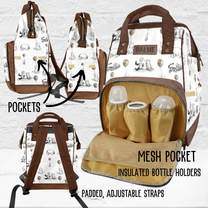 Our winnie the pooh and friends diaper bag is shown with the brown handles and straps. The backside has padded brown shoulder straps, the sides have pockets on both sides. The front view is shows with the outer pocket open to view the 3 insulated bottle holders and mesh pocket.