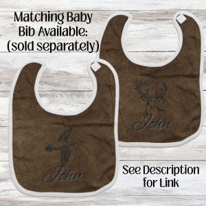 Matching Baby Bib in masculine colors of brown and black sold separately.