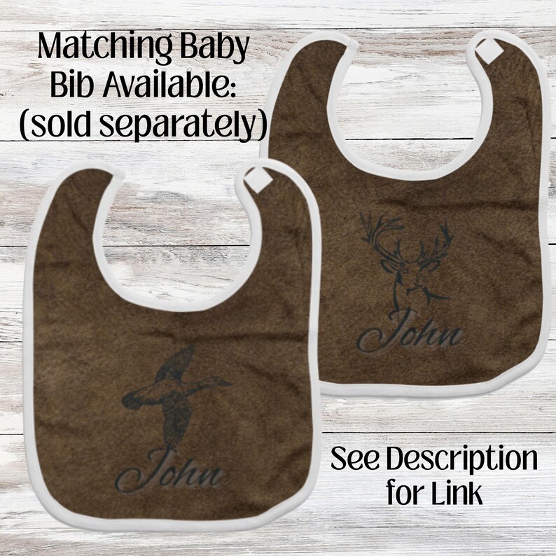 Matching Baby Bib in masculine colors of brown and black sold separately.