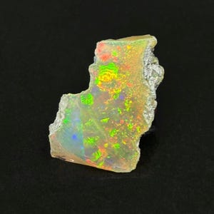 Uncut Welo Ethiopian Tinctured Frequency Opal Stone