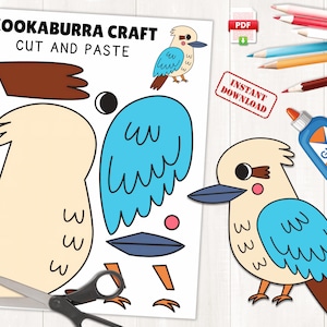 May include: A Kookaburra craft template with the text "KOOKABURRA CRAFT CUT AND PASTE". The template features a Kookaburra bird design with blue wings, a brown beak, and a beige body. Scissors, glue, and colored pencils are also included in the image.