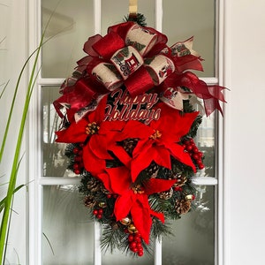 Christmas Wreath - Red poinsettias, bells, berries and pinecones