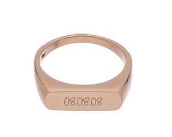 May include: A rose gold signet ring with a rectangular top engraved with the date "08.08.08"