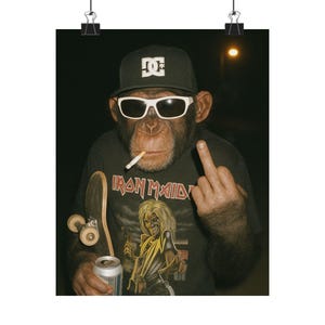 May include: A poster featuring a chimpanzee wearing a black DC hat, white-framed sunglasses, and an Iron Maiden t-shirt. The chimp is holding a skateboard and a can, with a cigarette in its mouth and giving the middle finger.