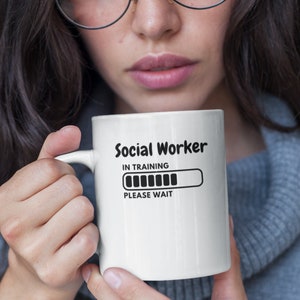 Social Worker in Training: Please wait with loading bar graphic social work student coffee mug gift for social work trainees aspiring carers
