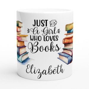 May include: White ceramic mug featuring a black and white graphic of a stack of books and the text "Just a Girl Who Loves Books" with the name "Elizabeth" below the graphic.