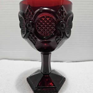 Avon Ruby Red 1876 Cape Cod Collection - Water Goblet 6" tall x 3.5" round with candle in the original box awesome vintage condition