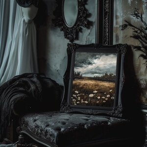 May include: A framed painting of a field of wildflowers with a cloudy sky in the background. The painting is in a dark wood frame with ornate details.