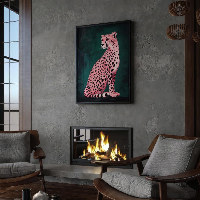 May include: A framed print of a pink cheetah sitting on a green background. The cheetah is facing to the right and has black spots. The frame is black and has a white mat.