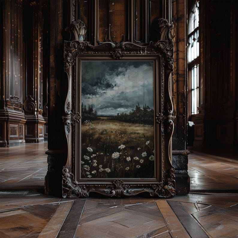 May include: An antique wooden frame with a dark brown finish holds a painting of a landscape with a cloudy sky and a field of white flowers.