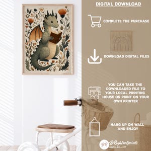 May include: A framed art print featuring a whimsical illustration of a green dragon reading a book, surrounded by flowers. The artwork has a neutral color palette with orange and brown accents. The text "DIGITAL DOWNLOAD" is visible.