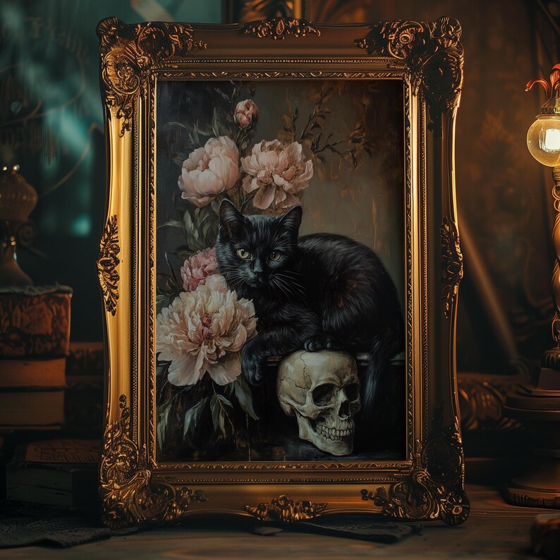 May include: A black cat sits on a skull with a bouquet of pink and white flowers in a gold ornate frame.