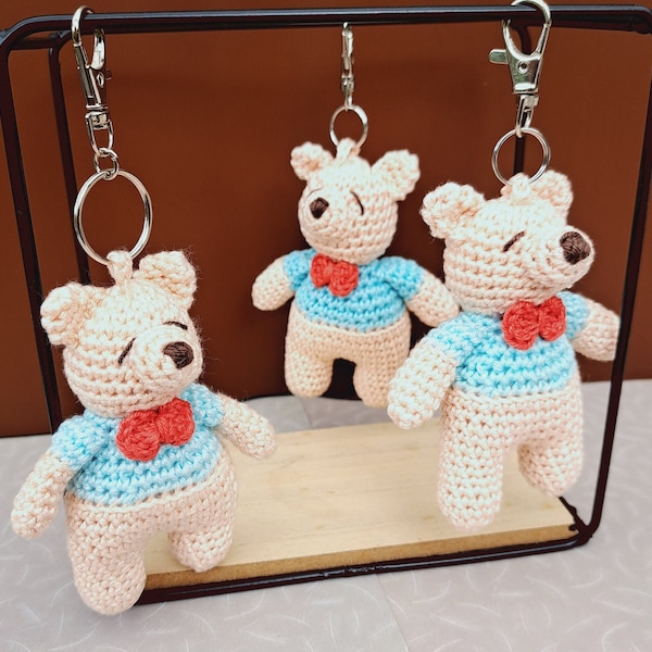 Bear keychain amigurumi plush, 9cm crocheted cuddly toy handmade finished product teddy bear, closed eyes and bow, personalized