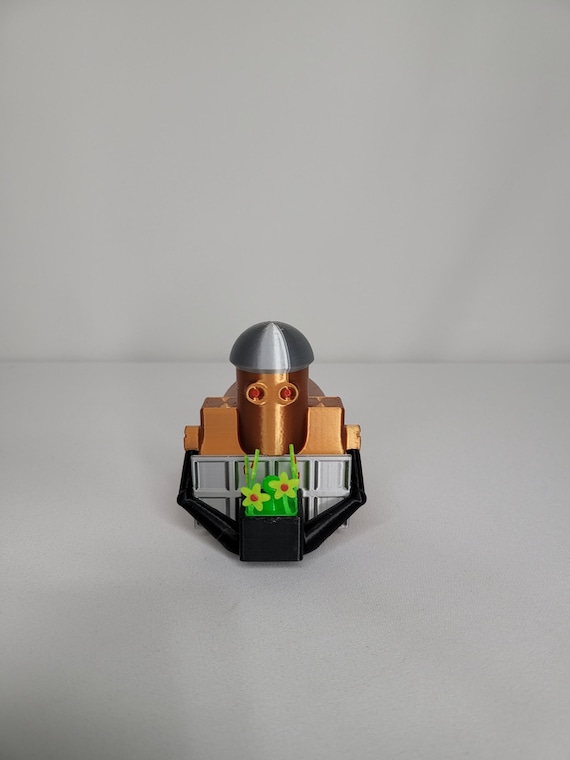 Krusty the Robot – Mini Rolling Robot Toy with Flowers | Blooming Comet Mascot Figurine