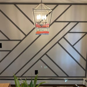 The custom-made wall molding project we completed for Tae Uptegrow