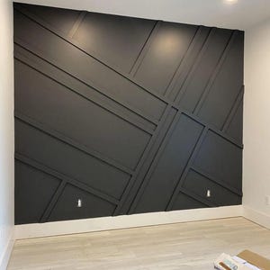 The custom-made wall molding project we completed for Kayla