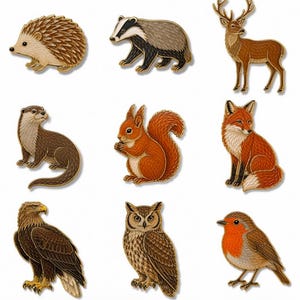 May include: A collection of nine enamel pins featuring detailed illustrations of woodland animals including a hedgehog, badger, deer, otter, squirrel, fox, eagle, owl, and robin, each outlined with a thin gold-toned metal border.