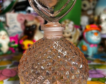 Frasco de perfume vintage de cristal con punta de diamante y forma de corazón rosa