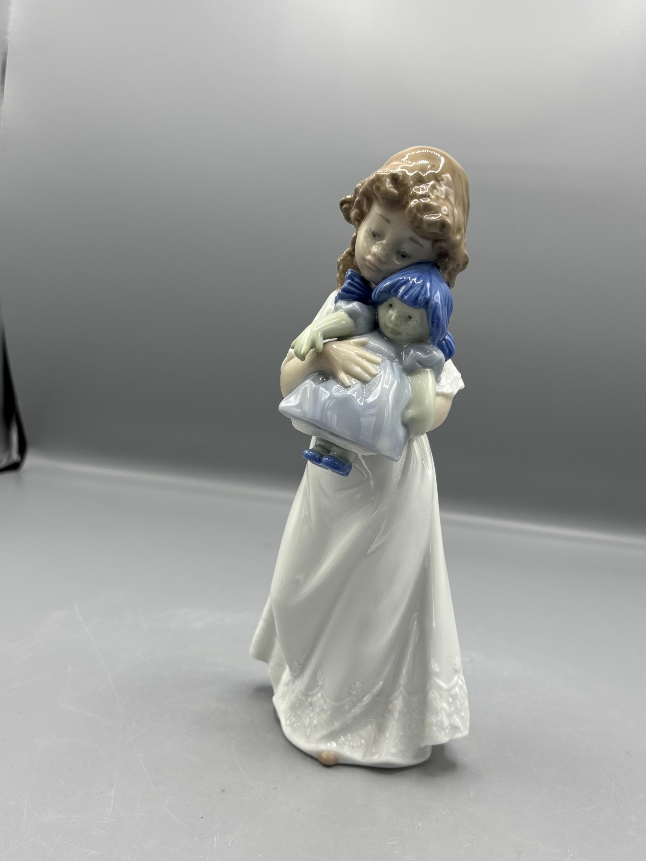 Nao by Lladro Girl With Doll 