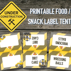 May include: Printable food and snack label tent templates with a construction theme. The labels feature yellow and black striped backgrounds with a construction worker graphic and the text "Dirt Cake" and "Wrecking Balls".