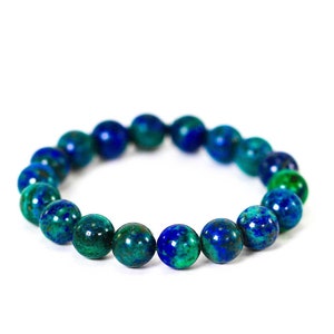 May include: A blue and green gemstone bracelet with round beads.