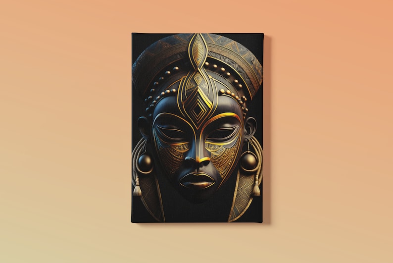 May include: A canvas print featuring a stylized African mask. The mask is primarily black with intricate gold-colored details, including the headdress, facial features, and decorative elements. The artwork has a three-dimensional appearance.