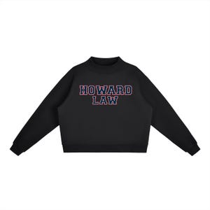 May include: Black crew neck sweatshirt with the text "HOWARD LAW" in red and blue lettering. The sweatshirt has long sleeves and a cropped fit. The design is centered on the chest.