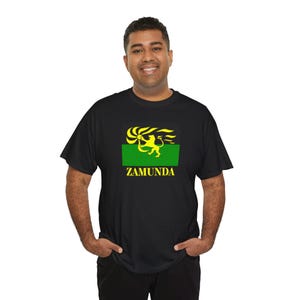 May include: Black t-shirt with a yellow and green graphic of a lion holding a sun with the text "ZAMUNDA" underneath.