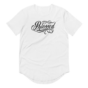 May include: White t-shirt with a curved hem and a black graphic that says "Blessed" in a stylised font.