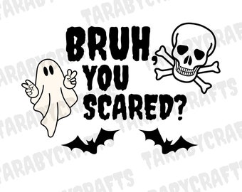 May include: A Halloween-themed graphic with the text "BRUH YOU SCARED?" in bold black letters. The design includes a cartoon ghost, a skull and crossbones, and two black bat silhouettes, all on a white background.