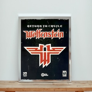 May include: A framed poster for the video game Return to Castle Wolfenstein. The poster features the game's title in red and white text, a red and white wolf's head logo, and the game's rating of M for Mature.