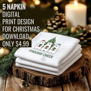 May include: A stack of white Christmas napkins featuring a cartoon polar bear design. The bears hold gifts near a Christmas tree. Text on the napkins reads "#HOLIDAY CHEER". The image also includes text that says "5 NAPKIN DIGITAL PRINT DESIGN FOR CHRISTMAS DOWNLOAD".