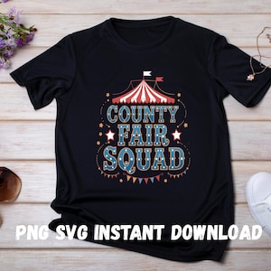 May include: Black t-shirt featuring a red, white and blue circus tent graphic and the text "COUNTY FAIR SQUAD".