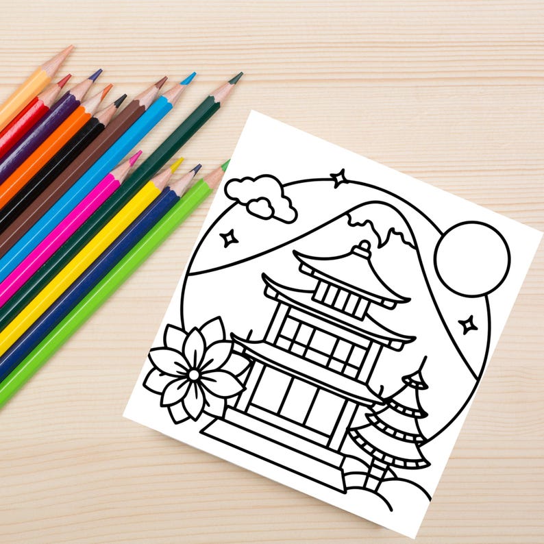 This mockup demonstrates how your Cozy Japan page looks when printed. Paired with colorful pencils, this setting highlights the file’s printability and invites viewers to imagine coloring it themselves.