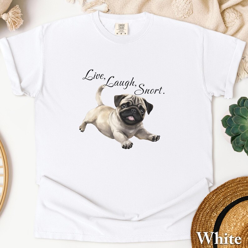 May include: White t-shirt with a pug illustration and the text "Live. Laugh. Snort."