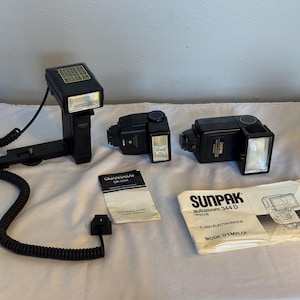 Vintage Camera Thyristor Triple Flash Pack: 1) Sunpak Auto Zoom 344 D, 2) External Flash with Bracket Mount, 3) Quantaray QB-350A, Untested