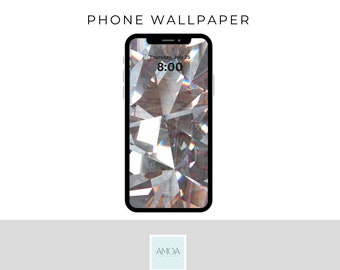 May include: A smartphone displaying a diamond-like wallpaper with a time and date display. The phone is black with a white background. The text "PHONE WALLPAPER" is above the phone. The logo "AMOA" is at the bottom.