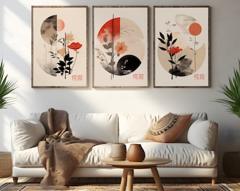 Peut inclure: Trois impressions encadrées avec des motifs floraux abstraits dans des tons de rouge, noir et blanc. Chaque impression présente un cercle avec une fleur stylisée et le mot "侘寂" en caractères japonais.