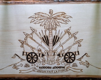 Escudo de armas de Haití grabado en madera de tilo.