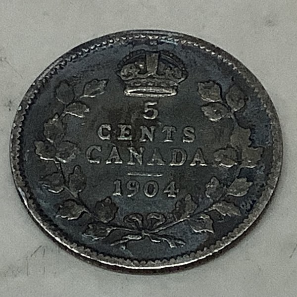 1904 Canadian Five cent coin considered Good condition letters and date legible with crown visible King Edwards face worn silver black color