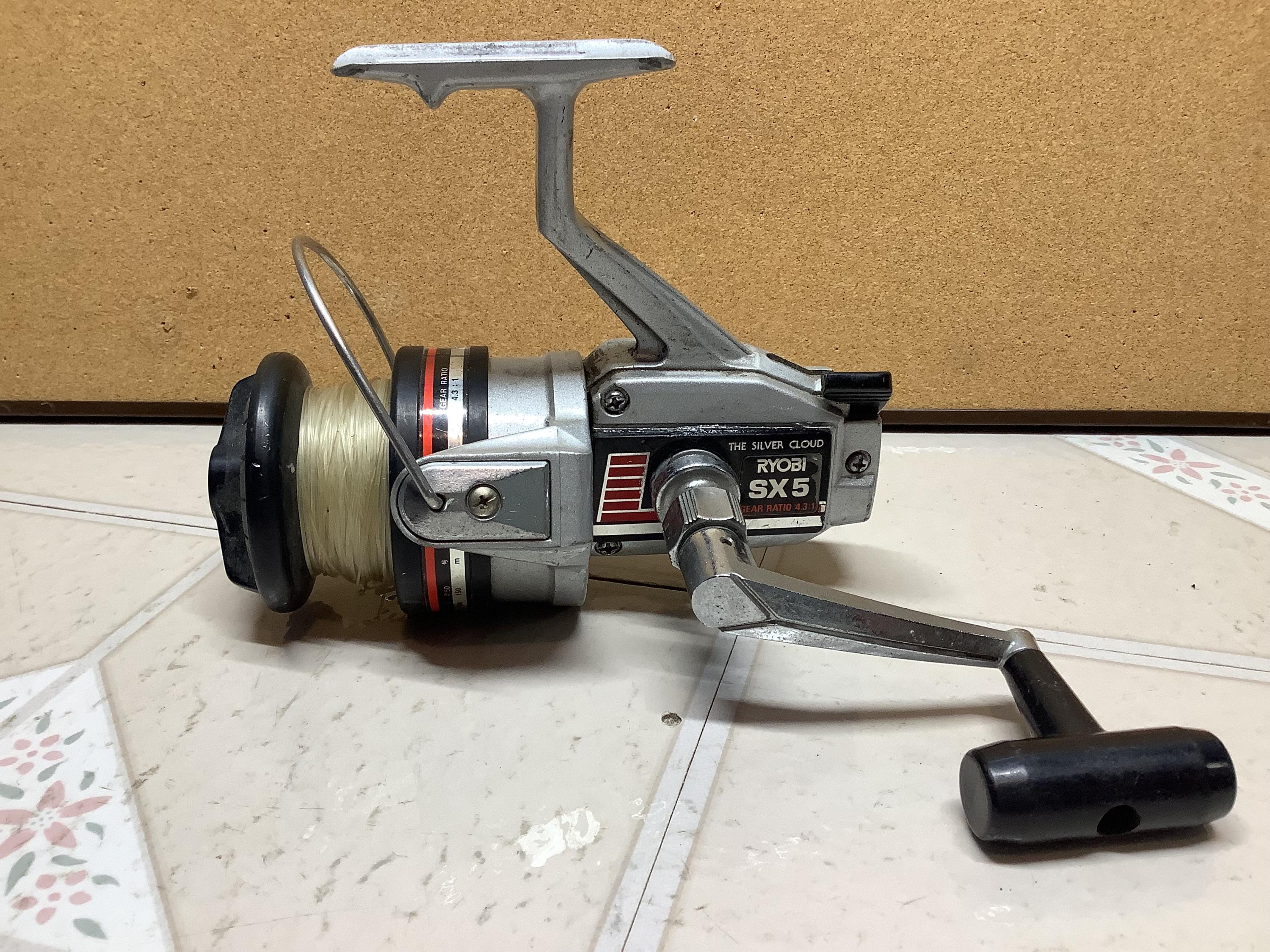 Reversible Ryobi Silver Cloud SX5 Spinning Reel Used and Great