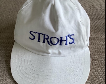 Vintage Stroh’s beer hat from the 1970’s White with blue embroidered letters has a rust looking stain on top of hat NOTHING on the inside