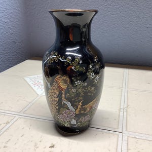 Vintage OMC Japanese multi colored Porcelain Vase with Peacocks on a Flowered Tree made in Japan circa 1970’s and 80’s black background