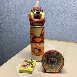 Taz Trio of the 90s, Six Flags container, Alarm clock, & FULL deck of playing cards. A nice set for Da TAZ collector, all between 1992-1996