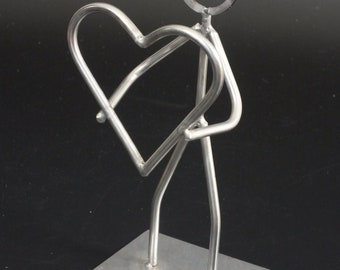 Stainless steel figure with heart