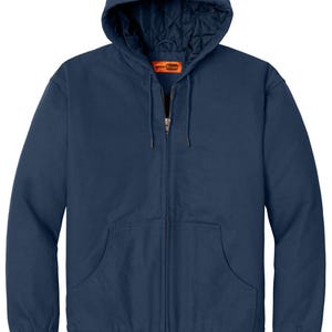 Puede incluir: Una chaqueta de trabajo azul marino con capucha, cierre de cremallera y un logotipo de Copper Stone en la parte delantera.