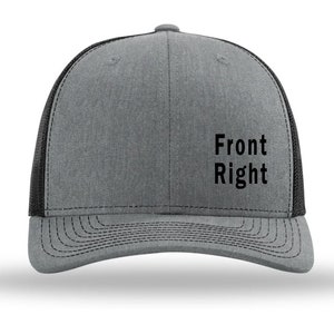 May include: A gray and black trucker hat with the words "Front Right" embroidered on the front.